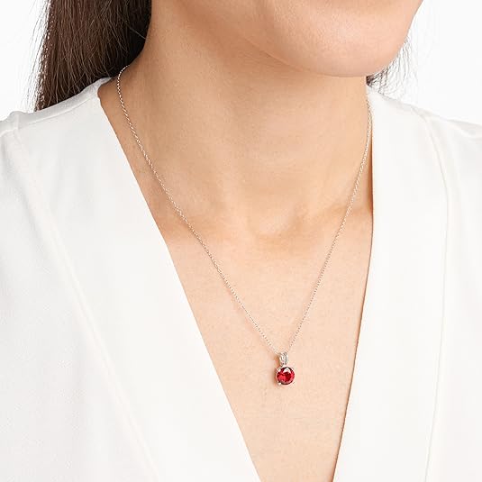 Round Cut Ruby Necklace In White Gold