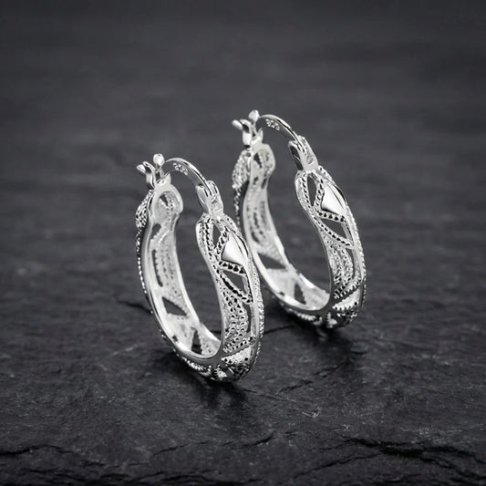 Elegant Carved Silver Earrings