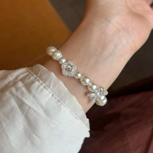 Elegant Pearl Crystal Bow Silver