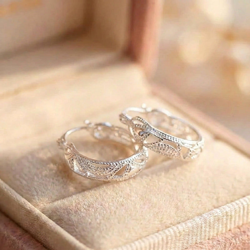 Elegant Hollow Carved Silver Hoop Earrings