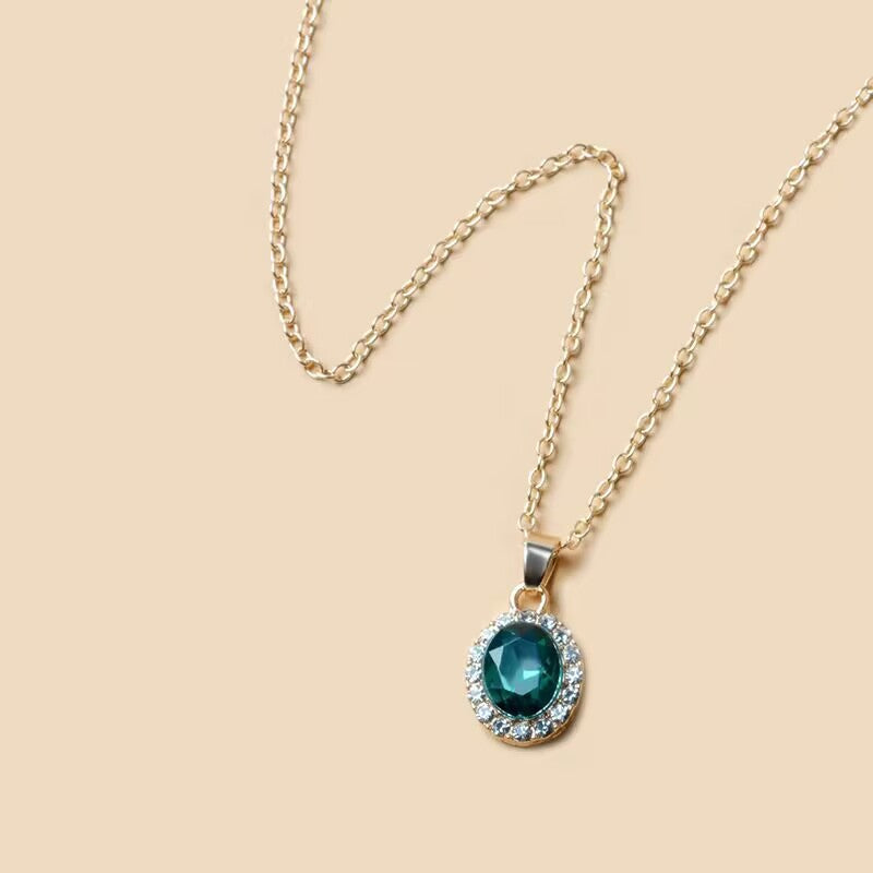 Elegant Emerald Halo Pendant Necklace