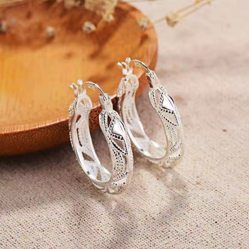 Hollow Carved Silver Hoop Earrings
